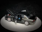 PGM 1/64 Nissan Skyline GT-R R32 Metallic Grey Luxury Round Stand Version - Image 3