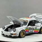PGM 1/64 RWB 964 #89 White Apple Livery Luxury Round Stand Version